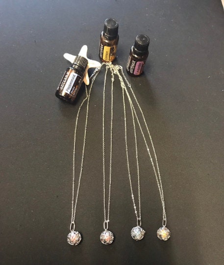 essential oil diffuser, Necklaces Ball Metal volcanic stone essential oil necklace girls, lockets aroma pendants openwork,